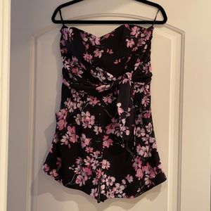 black and pink floral romper with tie in front